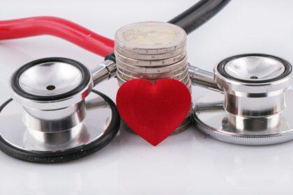 a stethoscope with a red heart on top of it