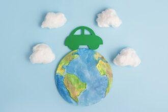 Green car and planet earth. Ecological transport. Ecology concept.