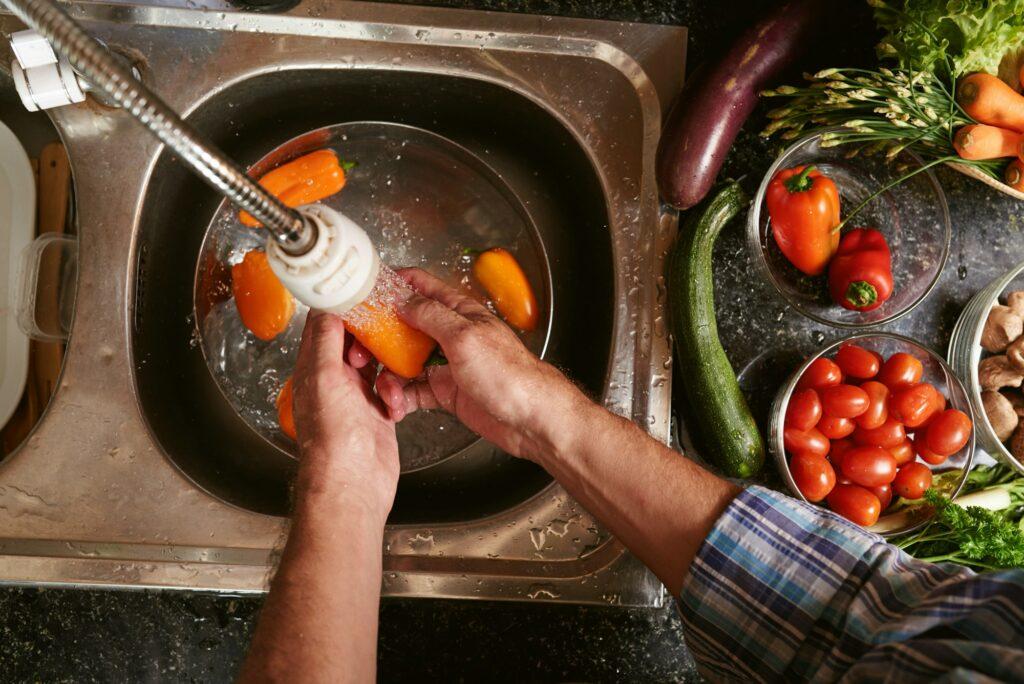 Washing bell peppers