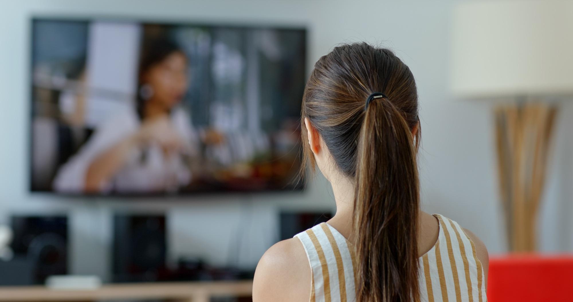Woman watch tv at home