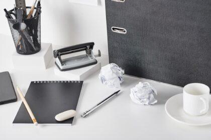 Office supplies on white background