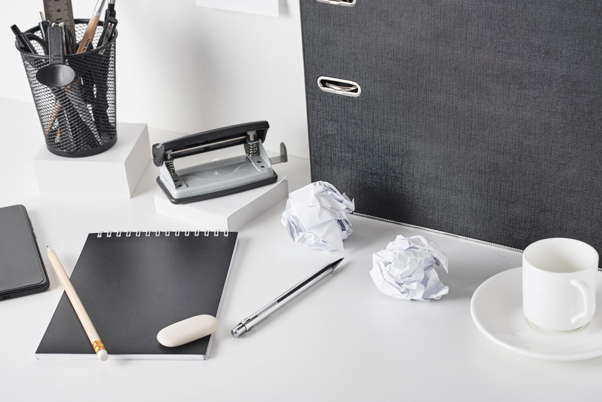 Office supplies on white background